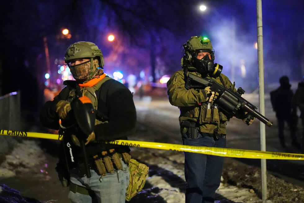 Agentes de policía en el lugar de un tiroteo reportado el miércoles 14 de enero de 2026 en...