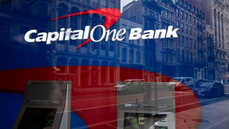 FILE - A Capital One Bank's ATM is shown, Thursday, March 25, 2021, in New York.
